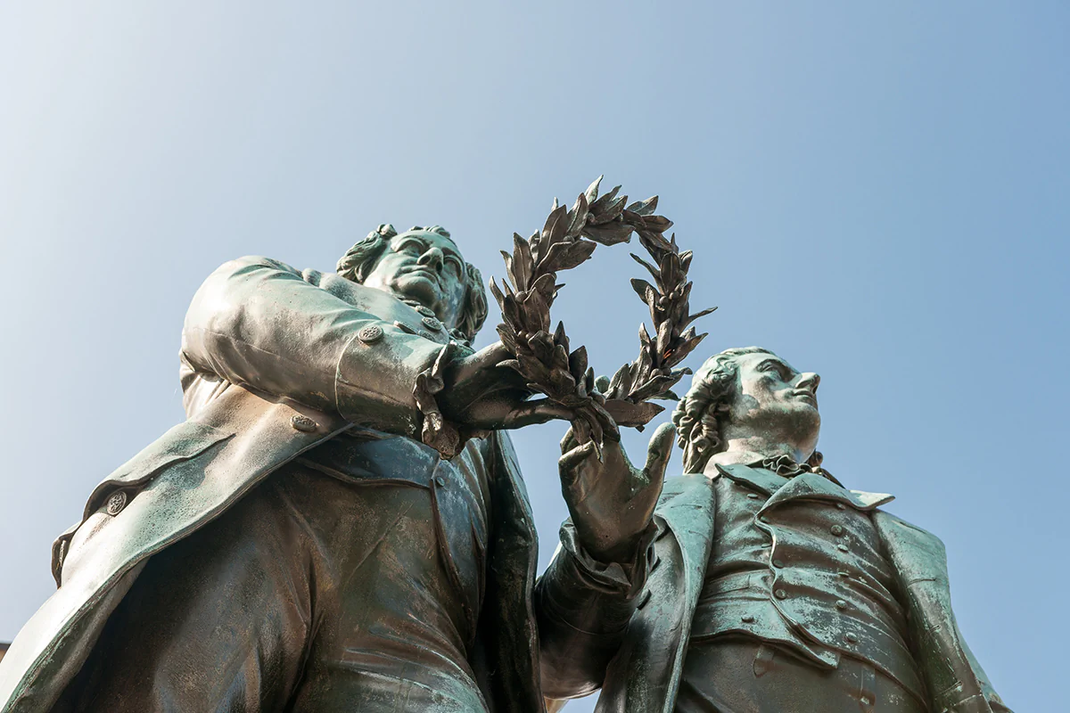 Goethe-Schiller monument on Theaterplatz in front of the German National Theater in Weimar. Photo: TTG Goethe-Schiller monument on Theaterplatz in front of the German National Theater in Weimar.